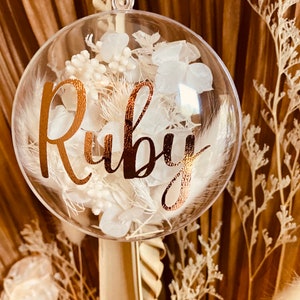 clear baubles filled with dried and preserved flowers decorations custom and personalised with any name
